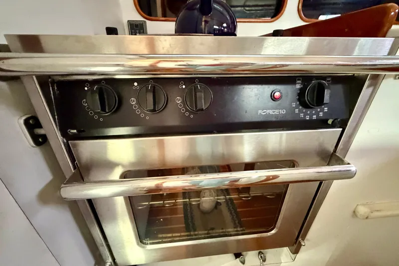 Kittywake Yacht Photos Pics Stainless steel oven in 1996 J Boats J/42 yacht galley.