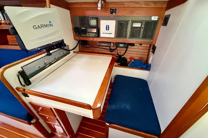 Kittywake Yacht Photos Pics Navigation station of a 1996 J Boats J/42 with Garmin and Furuno equipment.