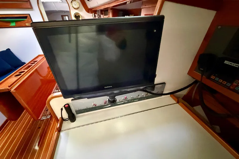 Kittywake Yacht Photos Pics Interior of 1996 J Boats J/42 with Garmin screen and wooden cabinetry.