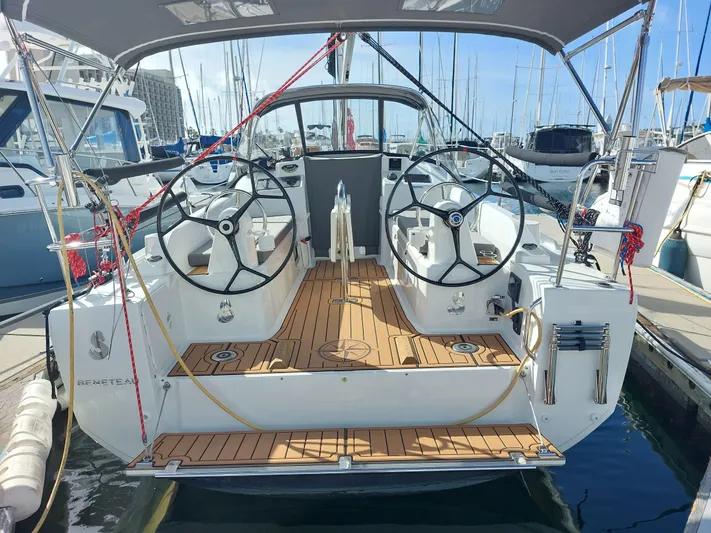 "makai" Yacht Photos Pics Beneteau Oceanis 30.1 sailboat, 2020 model, docked with dual steering wheels and teak deck.