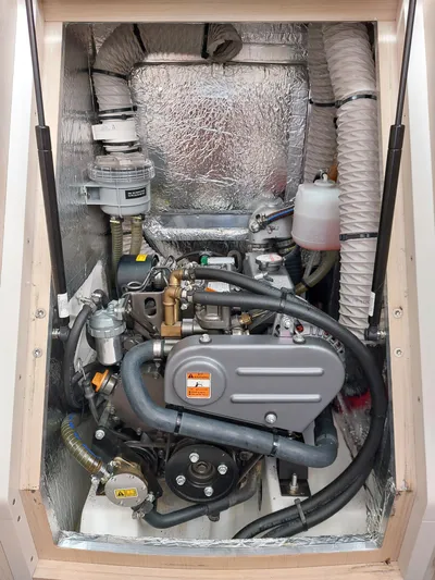 "makai" Yacht Photos Pics Engine compartment of a 2020 Beneteau Oceanis 30.1 sailboat, showcasing mechanical components.