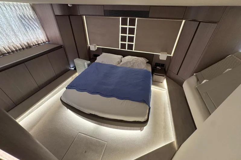  Yacht Photos Pics Luxurious bedroom interior of 2024 Galeon 560 Fly yacht with modern design.