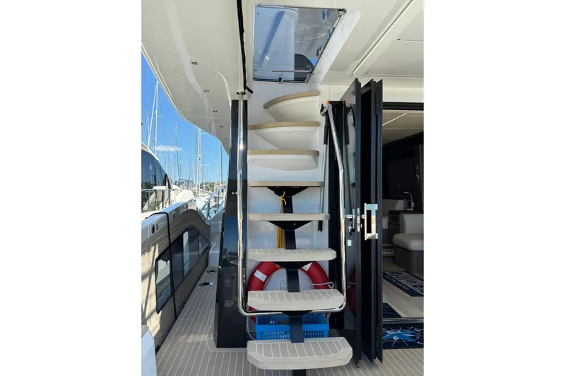 Yacht Photos Pics Staircase on 2024 Galeon 560 Fly yacht, leading to upper deck with modern design.
