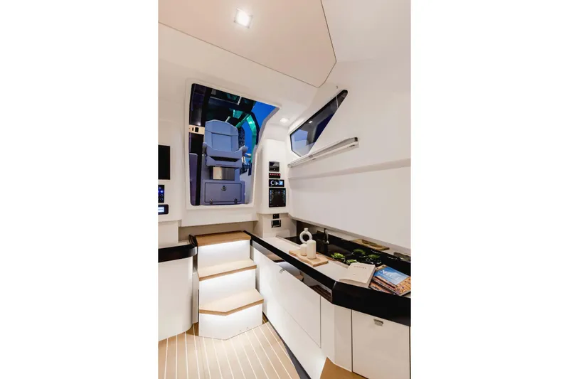  Yacht Photos Pics Modern interior of 2026 Fjord 39 XP yacht with sleek design and elegant lighting.