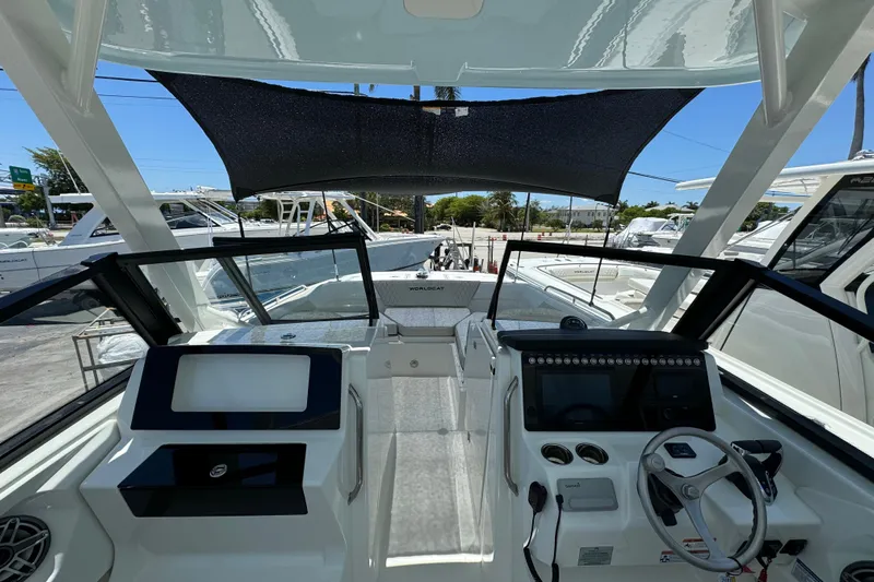 57800 265dc Sf Yacht Photos Pics 2026 World Cat 265 DC-X boat interior with modern dashboard and steering wheel.