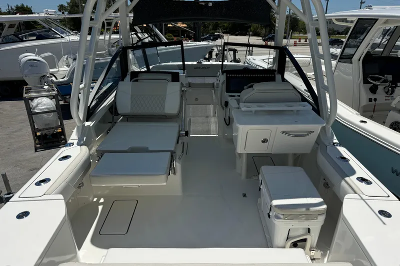 57800 265dc Sf Yacht Photos Pics 2026 World Cat 265 DC-X boat interior with seating and helm station.