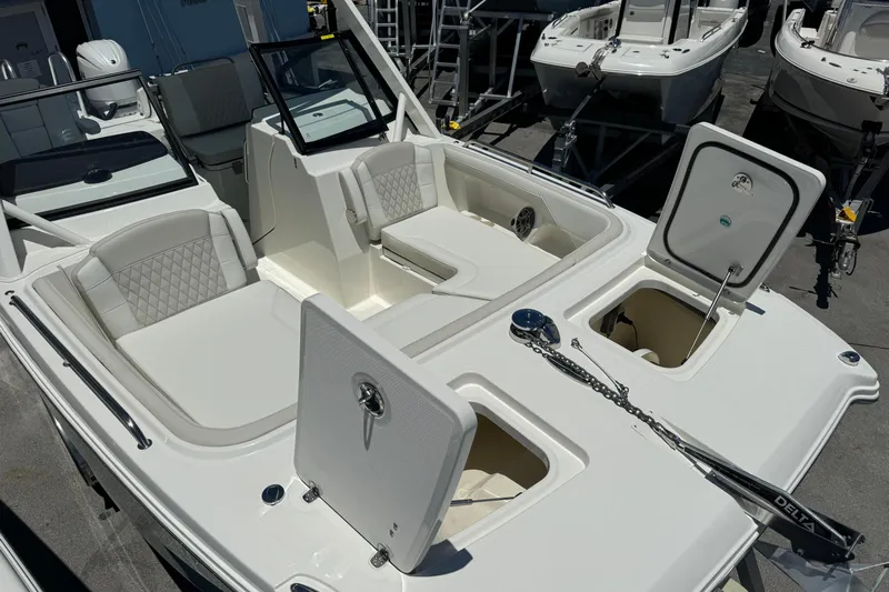 57800 265dc Sf Yacht Photos Pics 2026 World Cat 265 DC-X boat interior with open storage compartments and seating.