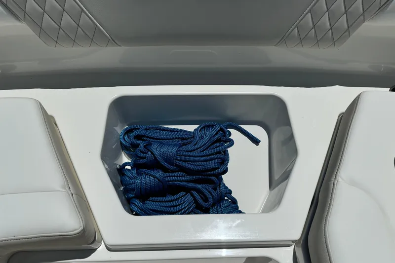 57800 265dc Sf Yacht Photos Pics Storage compartment with blue rope on 2026 World Cat 265 DC-X boat.