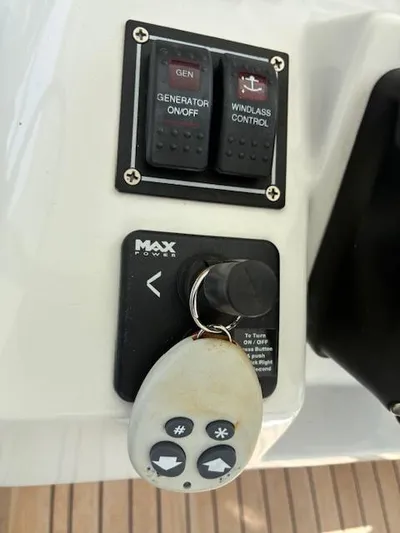  Yacht Photos Pics Control panel of a 2009 Intrepid 475 Sport Yacht with generator and windlass switches.