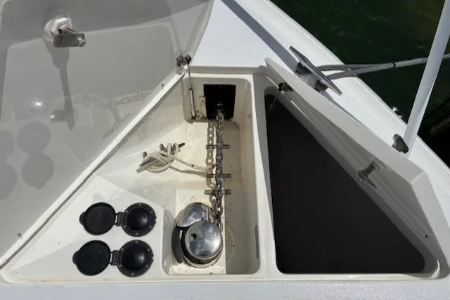  Yacht Photos Pics Anchor compartment of 2009 Intrepid 475 Sport Yacht with chain and winch.