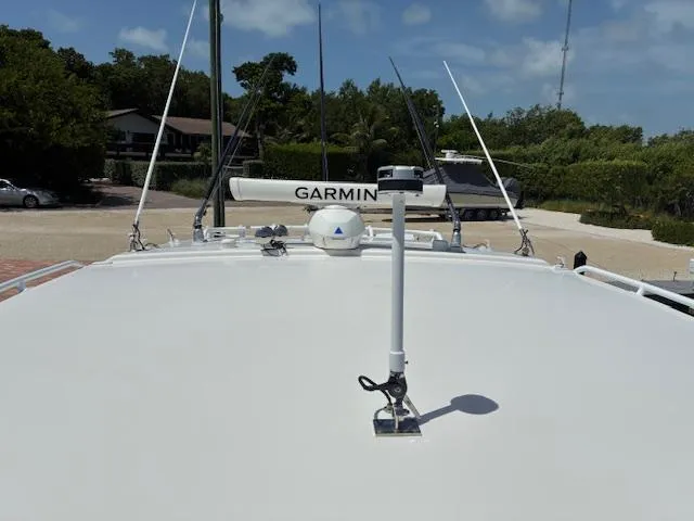  Yacht Photos Pics 2009 Intrepid 475 Sport Yacht with Garmin radar, docked in a sunny marina.