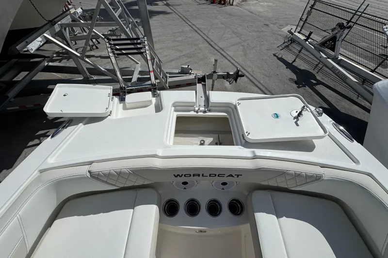 57582 230sd Sf Yacht Photos Pics 2026 World Cat 230 SD boat interior with seating and storage compartments.