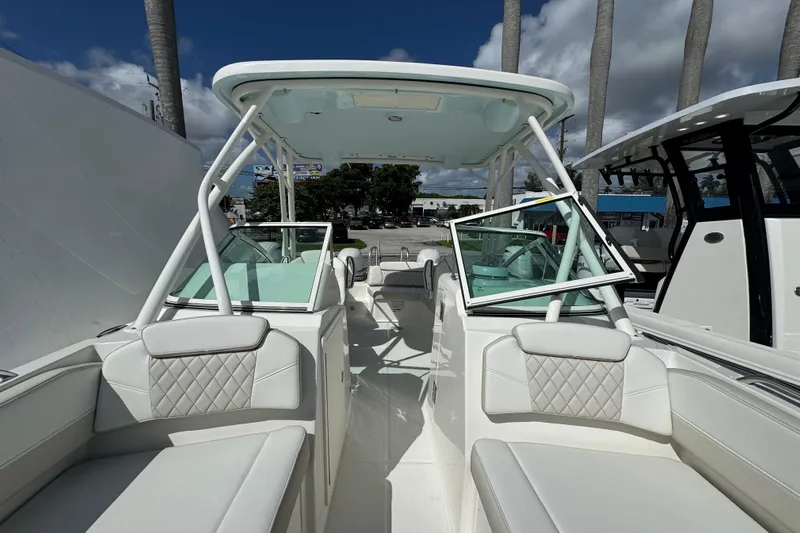 57582 230sd Sf Yacht Photos Pics 2026 World Cat 230 SD boat interior with luxurious seating and modern design.