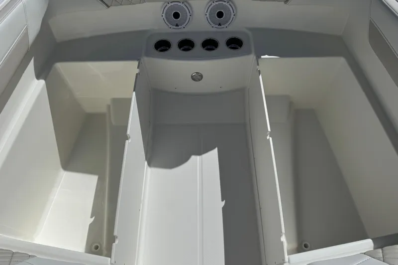 57582 230sd Sf Yacht Photos Pics 2026 World Cat 230 SD boat interior storage compartments and cup holders.