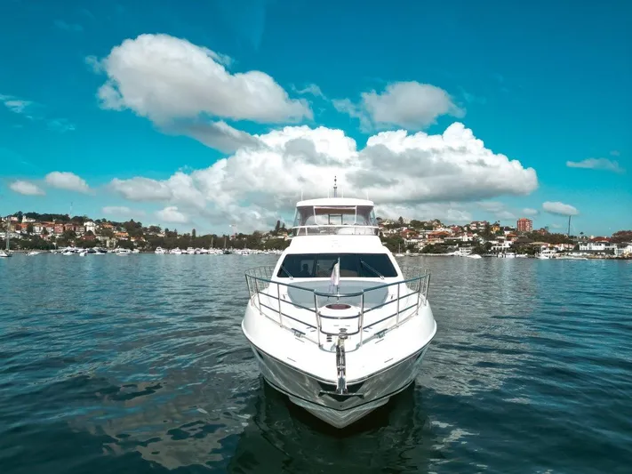 Azimut 62 Evolution Yacht Photos Pics Front view of a 2007 Azimut 62 Evolution yacht on a sunny day.