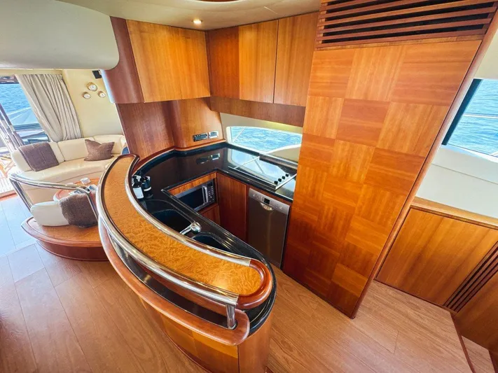 Azimut 62 Evolution Yacht Photos Pics Luxurious wooden interior of 2007 Azimut 62 Evolution yacht kitchen area.