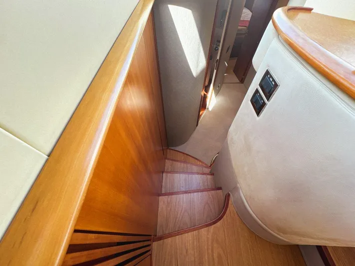 Azimut 62 Evolution Yacht Photos Pics Staircase inside 2007 Azimut 62 Evolution yacht with wooden finish and modern design.