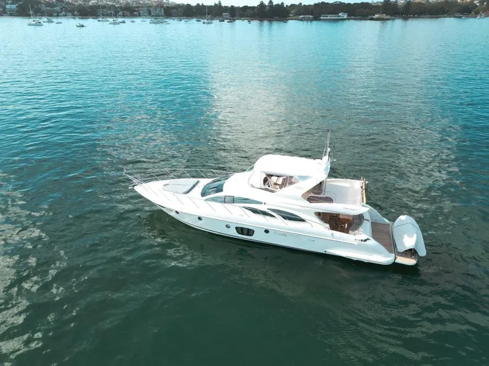 Azimut 62 Evolution Yacht Photos Pics 2007 Azimut 62 Evolution yacht on calm water, aerial view.