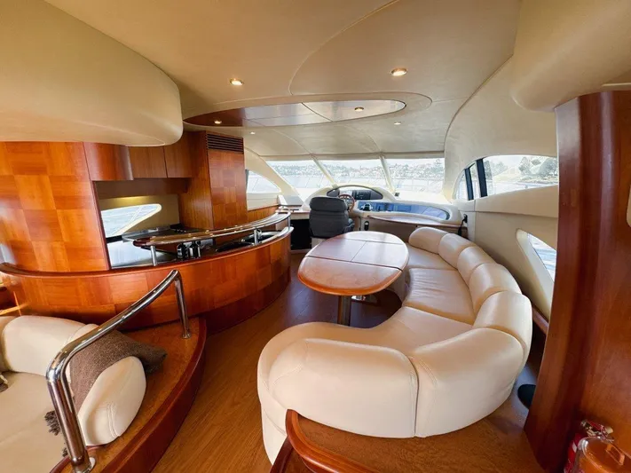 Azimut 62 Evolution Yacht Photos Pics Luxurious interior of a 2007 Azimut 62 Evolution yacht with elegant seating and wood finishes.