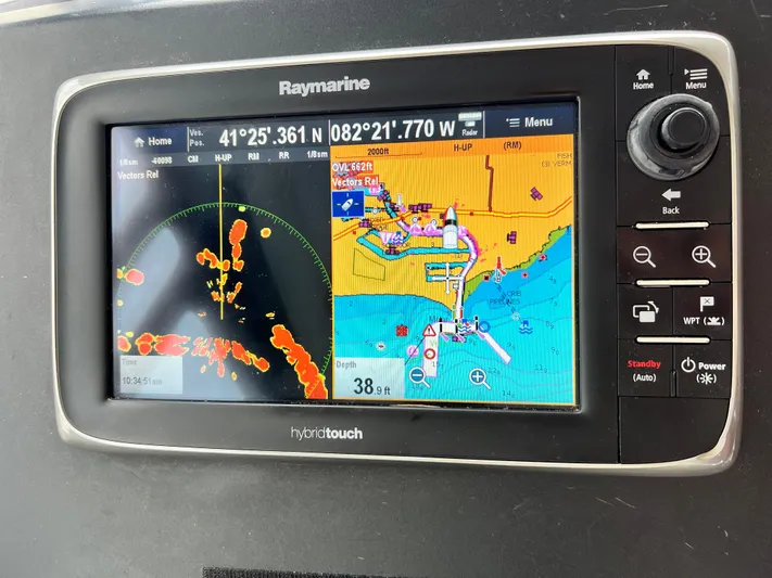  Yacht Photos Pics Raymarine navigation display on 2017 Jeanneau NC11 boat, showing radar and chart data.