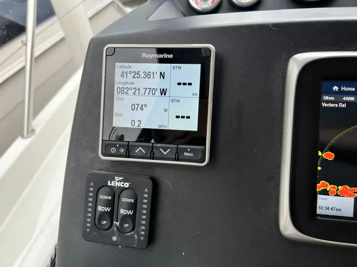  Yacht Photos Pics Navigation display on 2017 Jeanneau NC11 boat showing coordinates and controls.