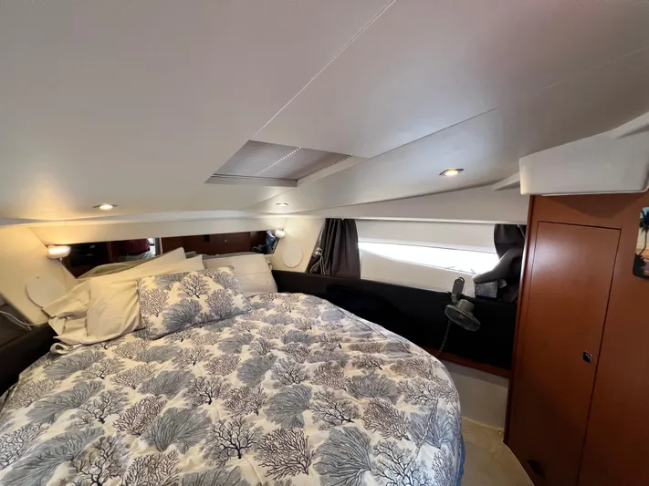  Yacht Photos Pics 2017 Jeanneau NC11 cabin with cozy bed and modern interior design.
