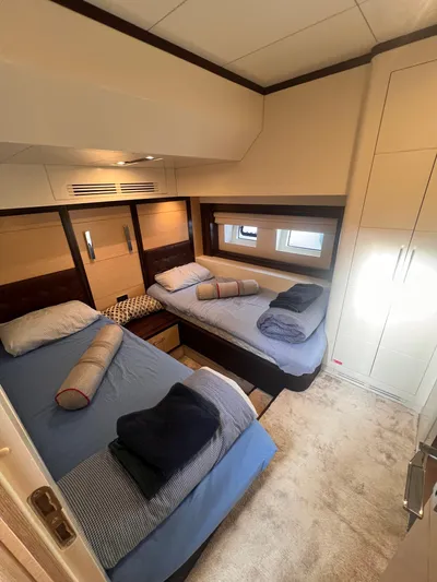  Yacht Photos Pics Twin bedroom in 2018 Sirena 64 yacht with modern decor and cozy bedding.