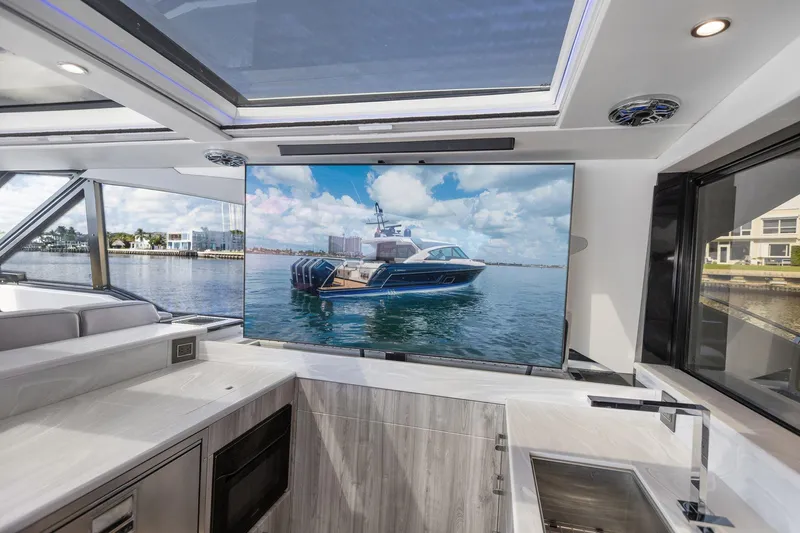 On Course Yacht Photos Pics Interior view of 2022 Formula 500 Super Sport Crossover yacht with large screen display.