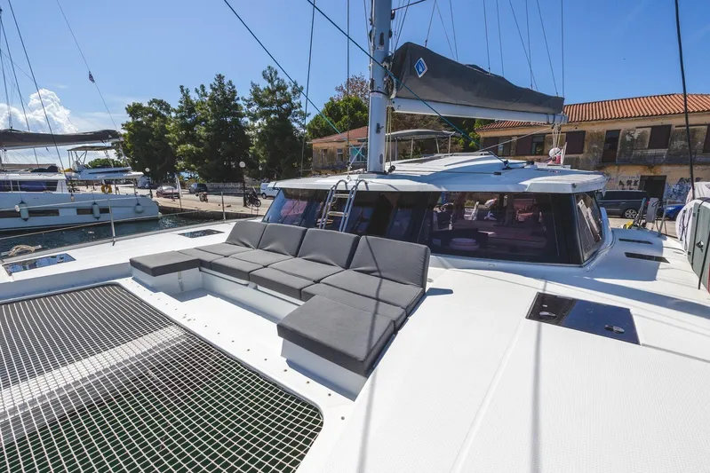  Yacht Photos Pics 2023 Fountaine Pajot Astrea 42 Maestro catamaran with spacious deck and comfortable seating.