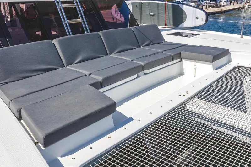  Yacht Photos Pics Luxurious seating area on 2023 Fountaine Pajot Astrea 42 Maestro catamaran deck.