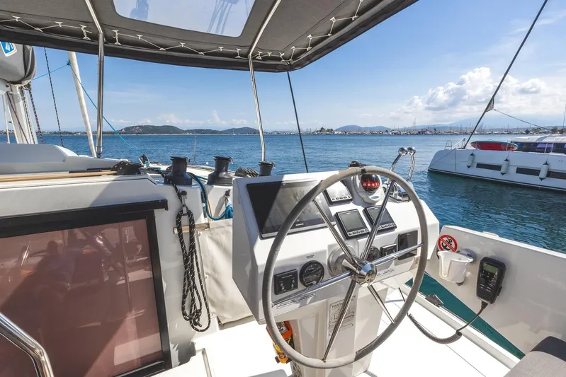  Yacht Photos Pics Helm of 2023 Fountaine Pajot Astrea 42 Maestro catamaran with ocean view.
