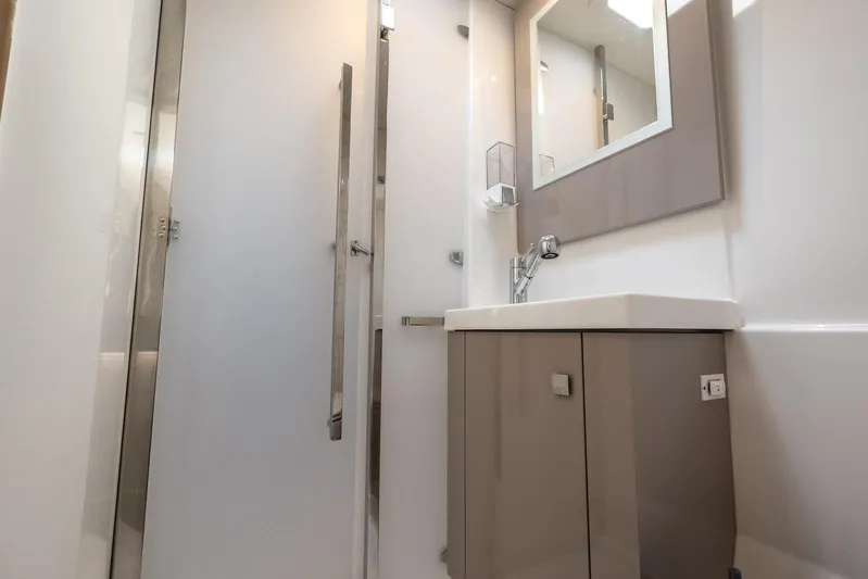  Yacht Photos Pics Modern bathroom interior on 2023 Fountaine Pajot Astrea 42 Maestro yacht.