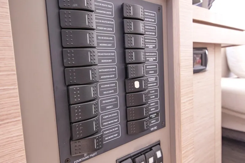  Yacht Photos Pics Control panel of 2023 Fountaine Pajot Astrea 42 Maestro yacht, featuring labeled switches.