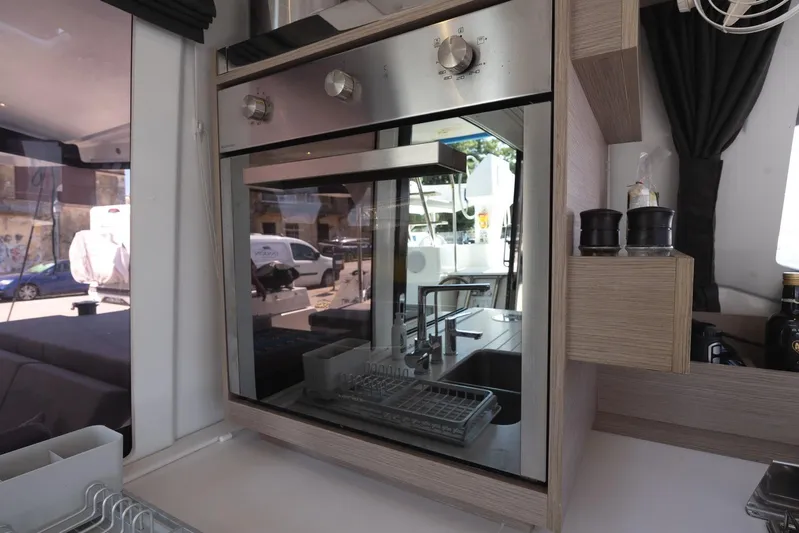  Yacht Photos Pics Modern kitchen interior of 2023 Fountaine Pajot Astrea 42 Maestro catamaran.