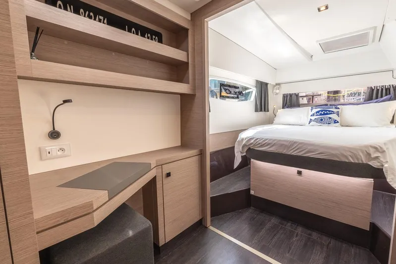  Yacht Photos Pics Luxurious interior of 2023 Fountaine Pajot Astrea 42 Maestro catamaran with modern bedroom design.