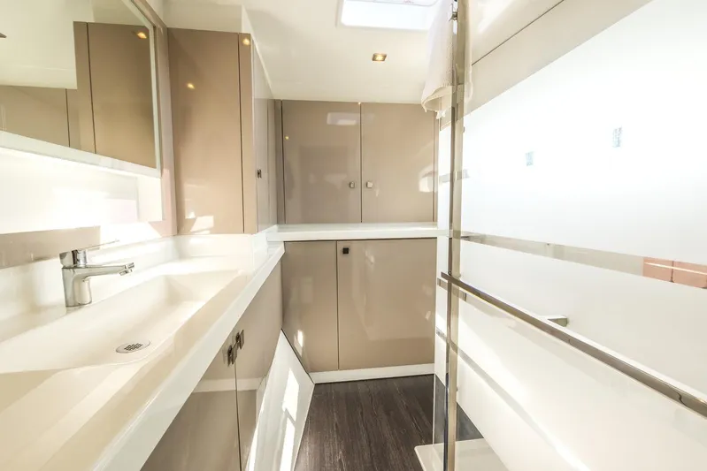  Yacht Photos Pics Luxurious bathroom interior of 2023 Fountaine Pajot Astrea 42 Maestro yacht.