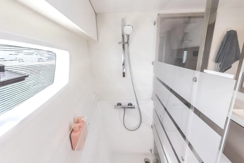  Yacht Photos Pics Modern shower area in 2023 Fountaine Pajot Astrea 42 Maestro yacht bathroom.