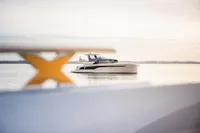 2025 Super Lauwersmeer SLX54 yacht on calm water, elegant design, serene setting.