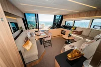 Luxurious interior of 2025 Super Lauwersmeer SLX54 yacht with elegant seating and panoramic views.