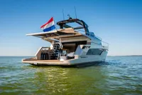 Luxury yacht Super Lauwersmeer SLX54 2025 on open water, featuring sleek design and spacious deck.