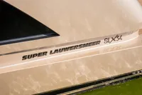 2025 Super Lauwersmeer SLX54 yacht detail with sleek design and branding.