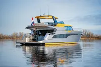 2025 Super Lauwersmeer SLX54 yacht on calm water, featuring sleek design and modern amenities.