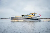 2025 Super Lauwersmeer SLX54 yacht cruising on open water.