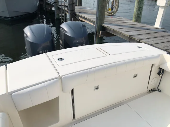  Yacht Photos Pics 2018 Regulator 28 Center Console boat with twin engines at dock.