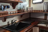 1984 Island Trader 40 yacht kitchen with wooden countertops and modern amenities.