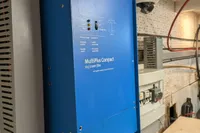 Blue Victron Energy MultiPlus Compact inverter installed on Island Trader 40, 1984 model.