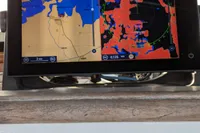 Navigation system on 1984 Island Trader 40 sailboat displaying nautical charts and radar.