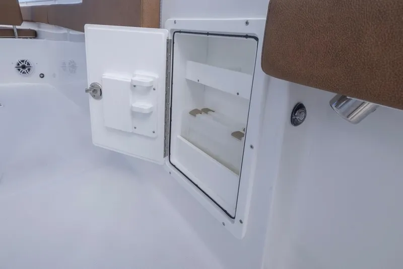  Yacht Photos Pics Open storage compartment on 2026 Sea Hunt Ultra 275 SE boat interior.