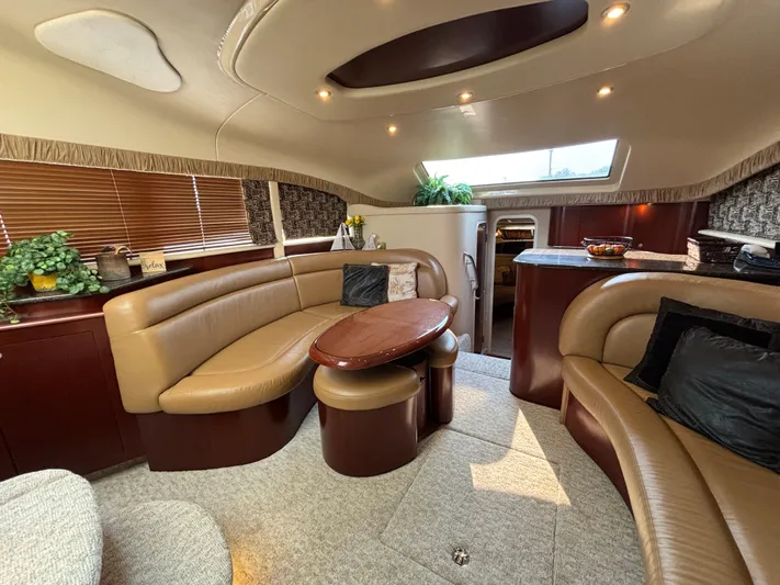 Tre Bella Yacht Photos Pics Luxurious interior of a 2005 Sea Ray 390 Motor Yacht with elegant seating and decor.