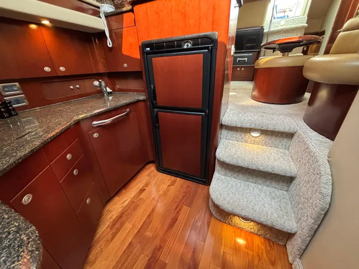 Tre Bella Yacht Photos Pics Luxurious 2005 Sea Ray 390 Motor Yacht interior with elegant wood finishes and modern amenities.